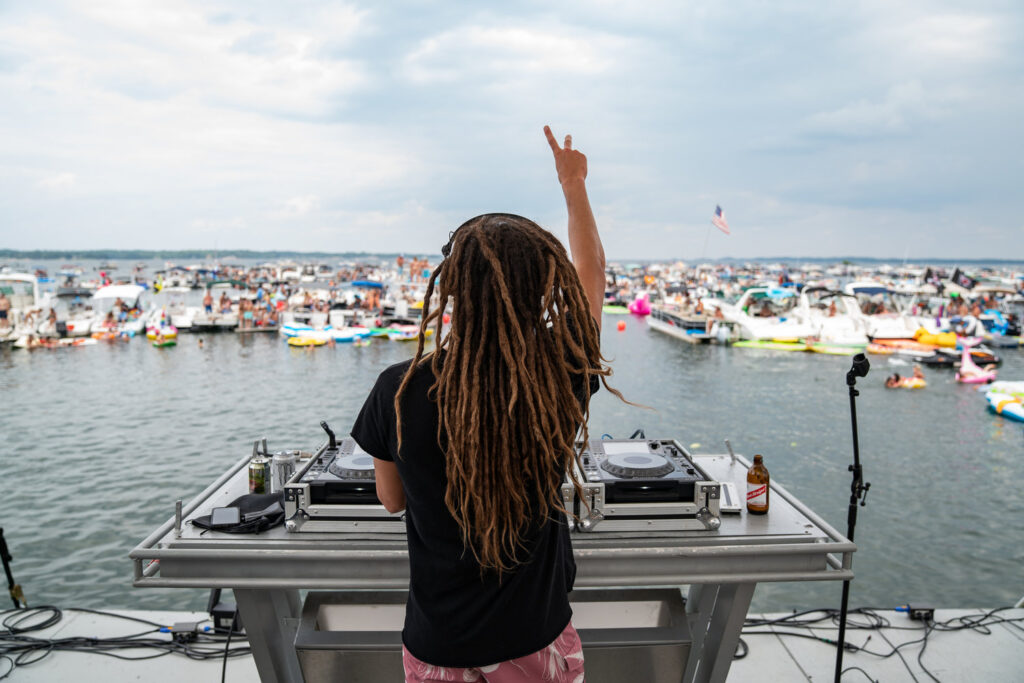 dj playing live music at a floating concert