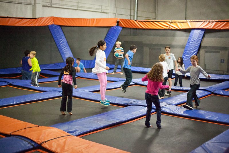 kids jumping on trampolines