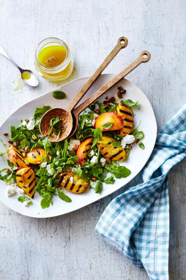 Grilled peaches, arugula and feta salad