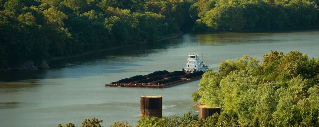 Tennessee River transporting raw materials to help the economy. 