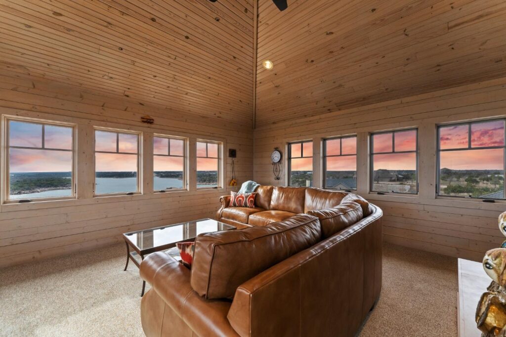 a room with a couch and 360 views