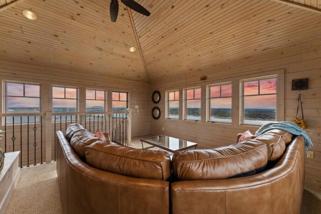 a room with a couch and 360 views