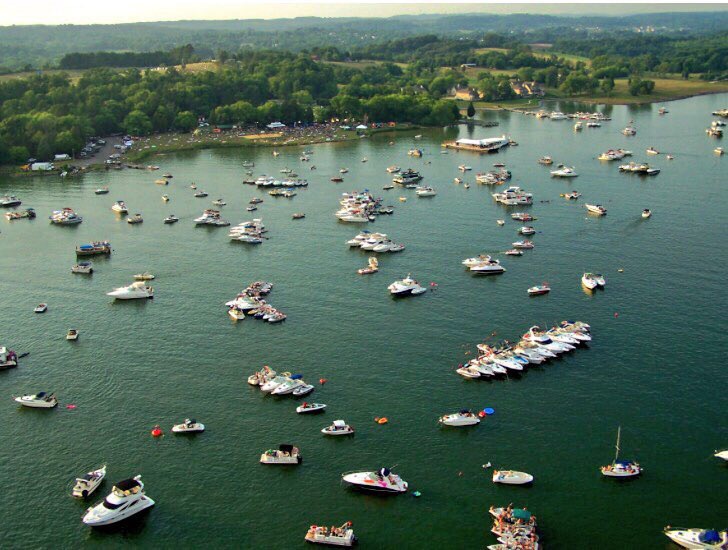 Boats scattered across Watts Bar Lake at Lenoir City's Rockin' the Docks annual event. 