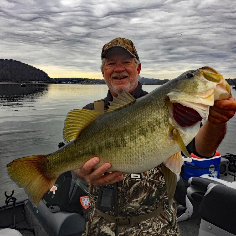 Man holding a largemouth bass