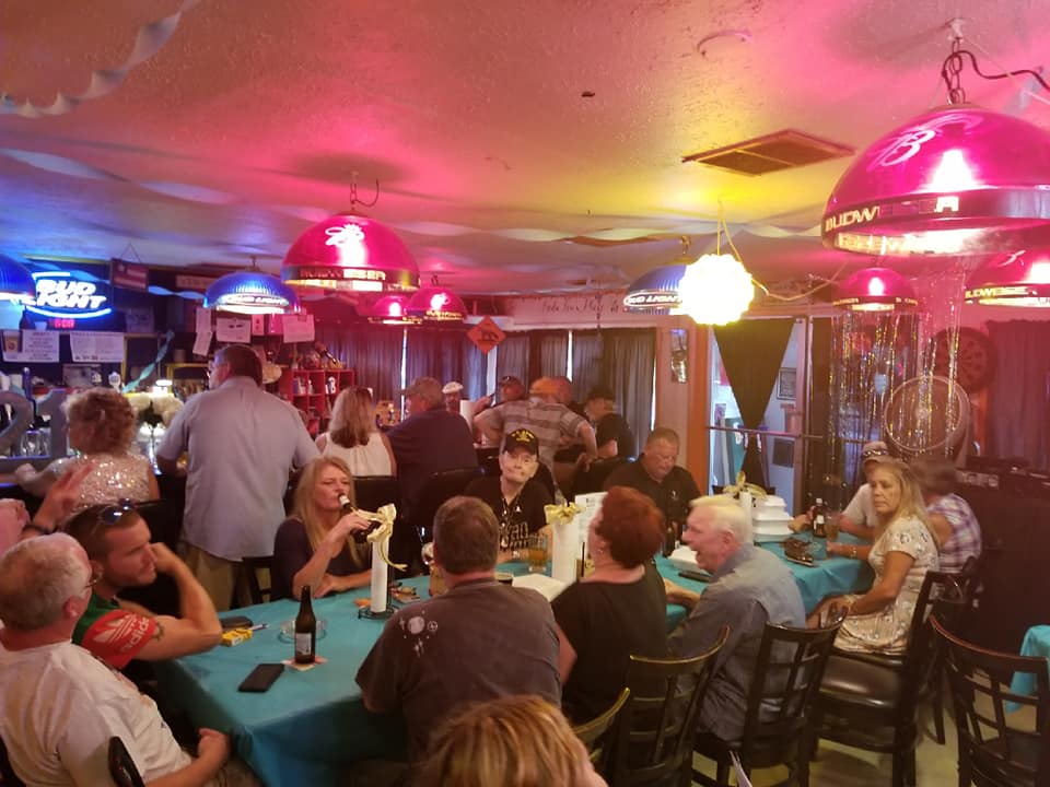 Inside of The New Brewery in Kingston---full of people relaxing and drinking beer.