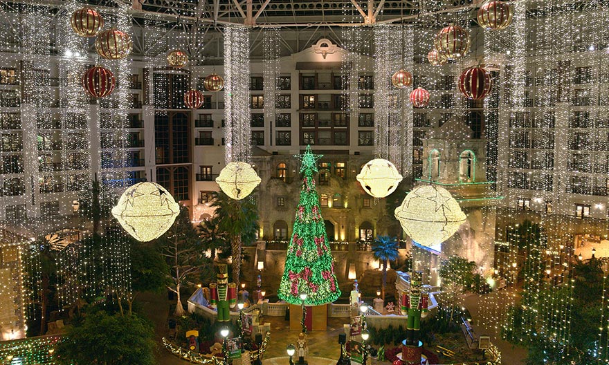 Christmas tree, giant bells, and lights inside the Gaylord Hotel and Resort in Grapevine, TX.