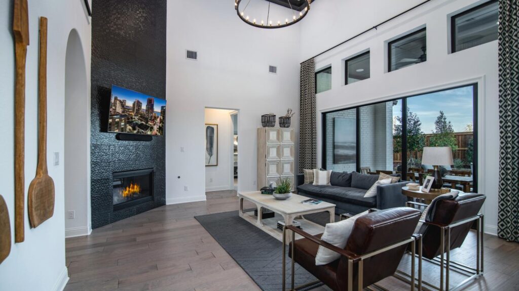 computer-generated image of a modern living room with tall ceilings.