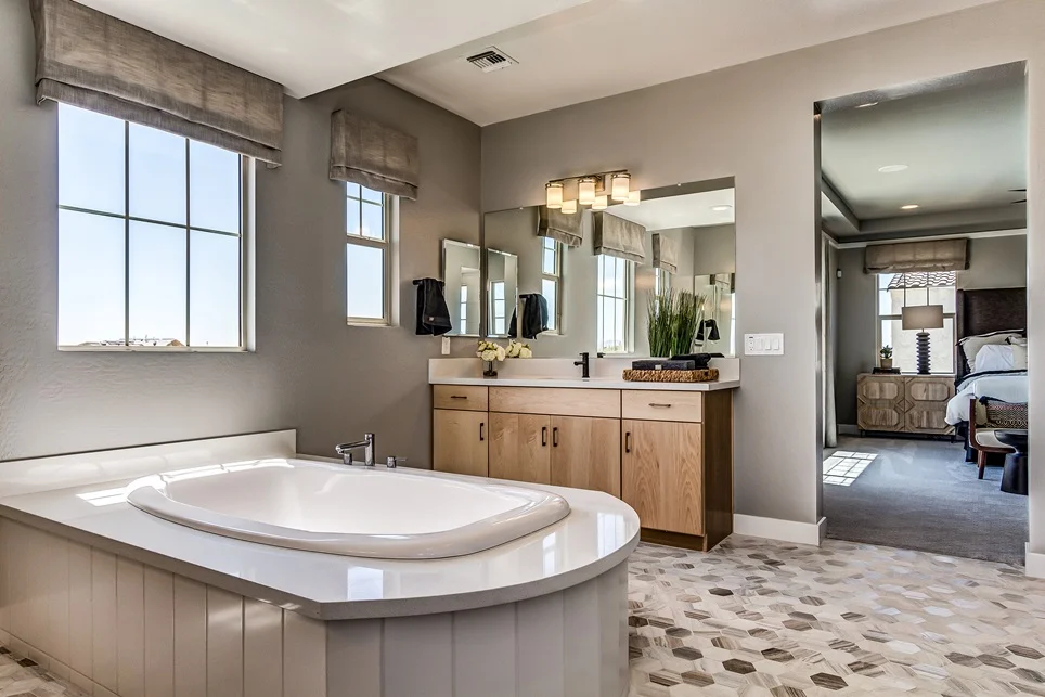 Bathroom with tile floor and brown walls.