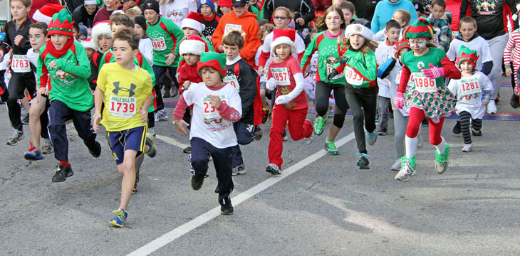 children running in holiday costumes
