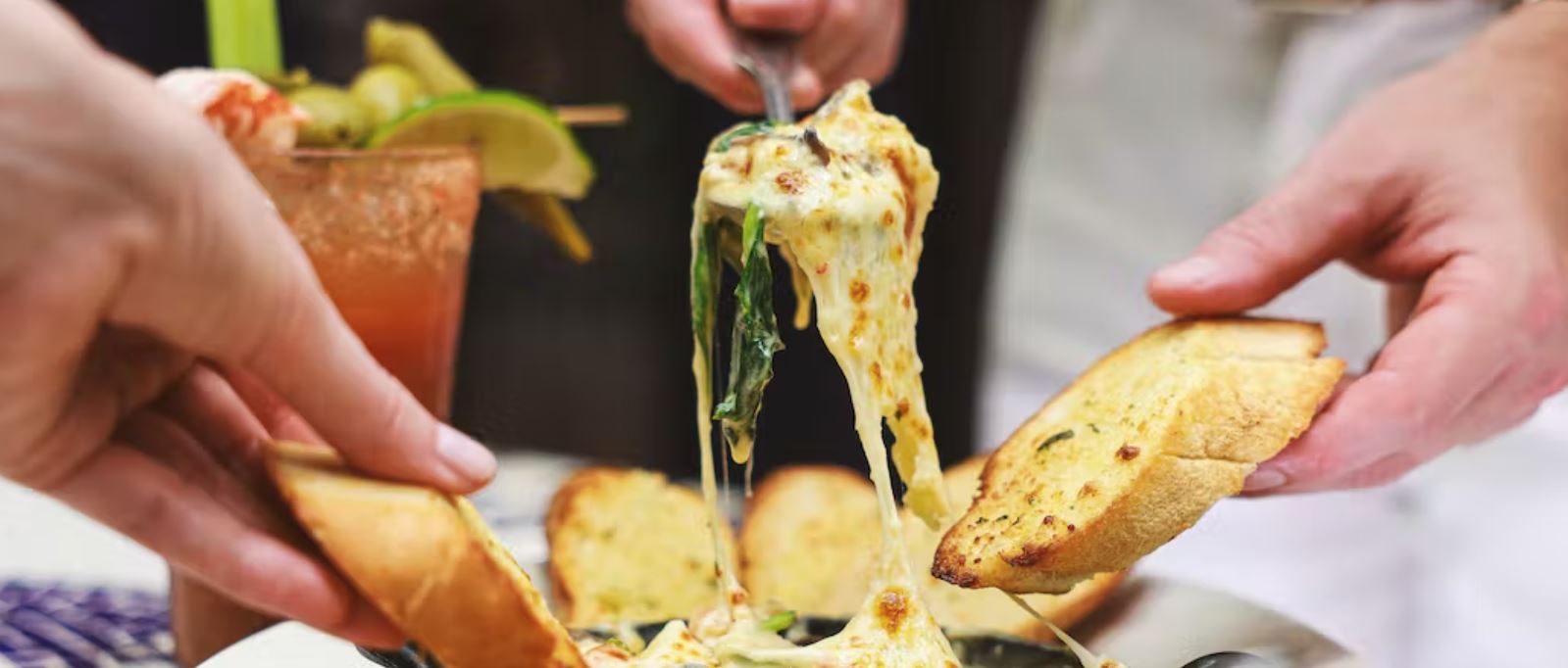 people eating bread and cheese, food